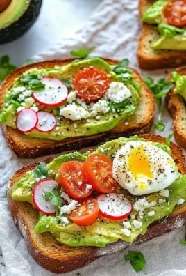 Delicious avocado toast topped with tomatoes and herbs on a plate