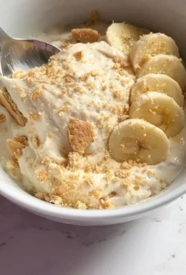 Delicious Banana Pudding Greek Yogurt Bowl topped with fresh bananas
