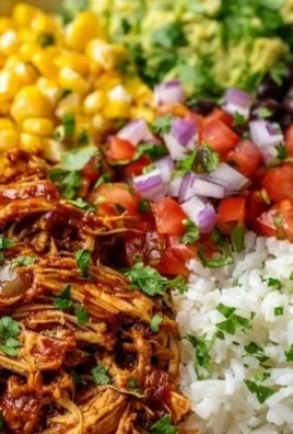 BBQ Chicken Burrito Bowl featuring grilled chicken, rice, and fresh toppings