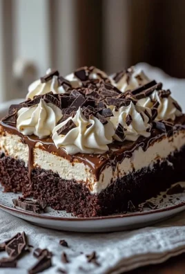 Decadent Brownie Refrigerator Cake topped with chocolate ganache