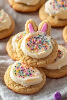 Colorful buttercream bunny cookies decorated for Easter celebrations