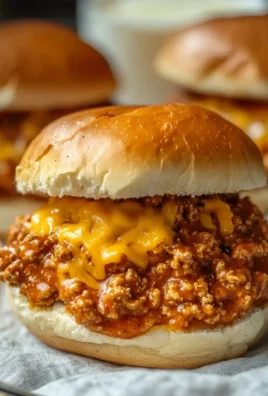 Cajun Chicken Sloppy Joes served on a plate with toppings