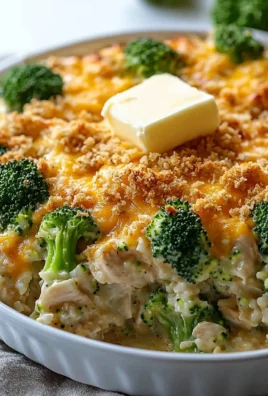 Delicious Cheddar Chicken Broccoli Bake topped with melted cheese and fresh broccoli