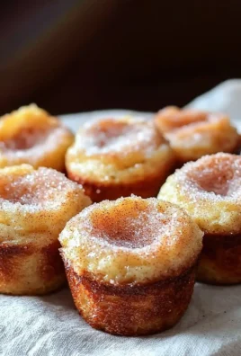 Delicious Cinnamon Sugar French Toast Muffins on a plate, perfect for breakfast.