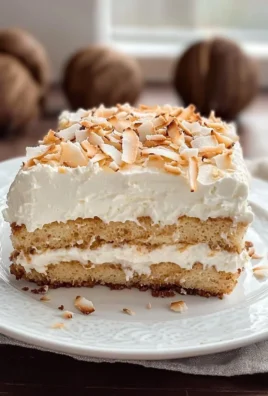 Delicious Coconut Tiramisu dessert with creamy coconut layers and cocoa