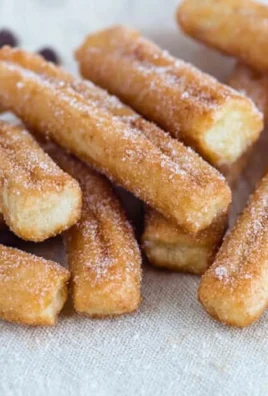 Delicious freshly made churros sprinkled with cinnamon and sugar
