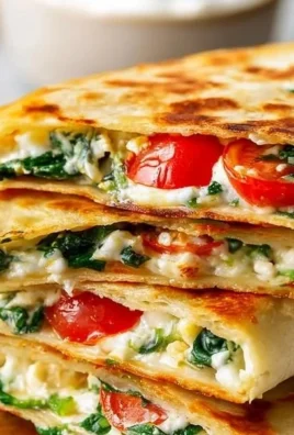 Delicious easy Mediterranean Quesadilla filled with fresh veggies and cheese