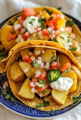 Delicious golden potato tacos served with toppings and fresh ingredients