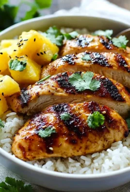 Hawaiian Chicken with pineapple and coconut rice on a plate