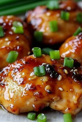 Delicious honey garlic chicken served on a plate with vegetables
