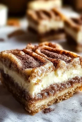 Delicious cinnamon roll bliss bars topped with creamy glaze