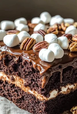 Decadent Mississippi Mud Cake topped with chocolate frosting