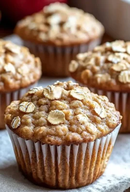 Moist applesauce oatmeal muffins fresh out of the oven, healthy and delicious.