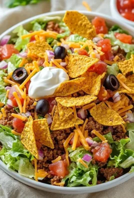 Colorful Simple Doritos Taco Salad with toppings and Doritos chips