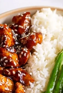 Asian High Protein Sesame Chicken dish with sesame seeds and vegetables