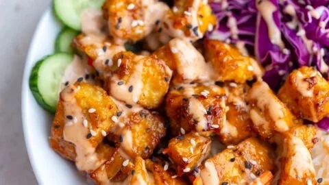 Delicious Bang Bang Tofu served in an air fryer or pan-fried for a crispy texture