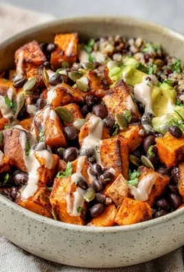 Chili-Lime Sweet Potato and Black Bean Bowls topped with fresh ingredients