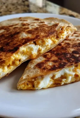 Cottage cheese egg white quesadillas with 32g protein served on a plate