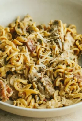 Creamy chicken garlic parmesan pasta in a bowl, low carb recipe