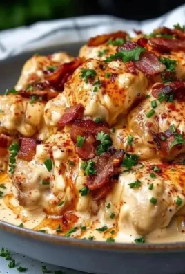 Creamy Keto Crack Chicken dish served in a bowl with herbs