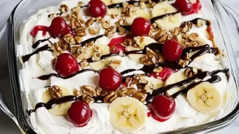 Delicious creamy no-bake banana split dessert for summer gatherings.