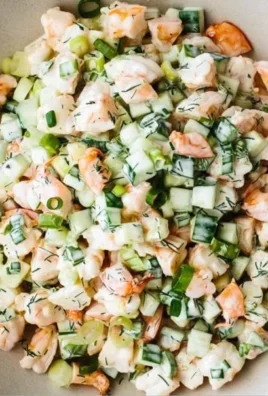Fresh Cucumber Shrimp Salad with herbs and spices on a plate