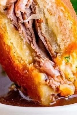 French Dip Sliders with juicy beef and cheese served with dipping sauce