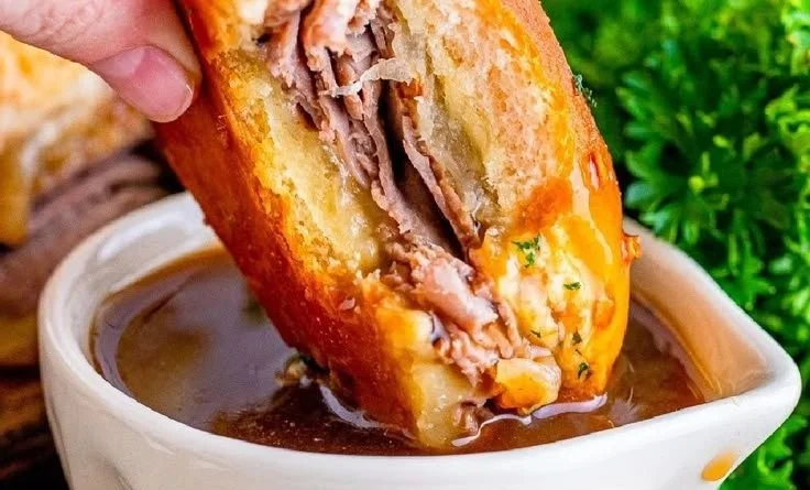 French Dip Sliders with juicy beef and cheese served with dipping sauce