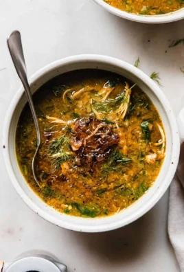 Delicious golden chicken and lentil soup in a bowl
