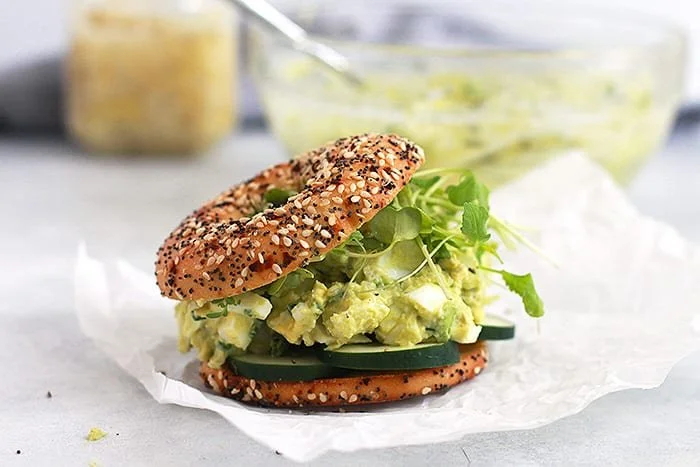 Gut-healthy avocado egg salad with vibrant ingredients served in a bowl.