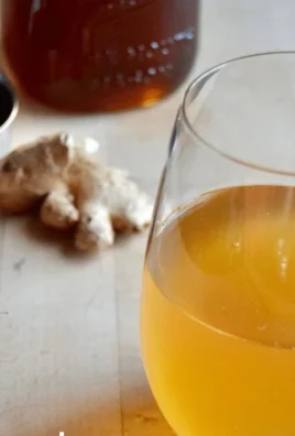 Refreshing Maple Sap Switchel drink served in a glass with ice