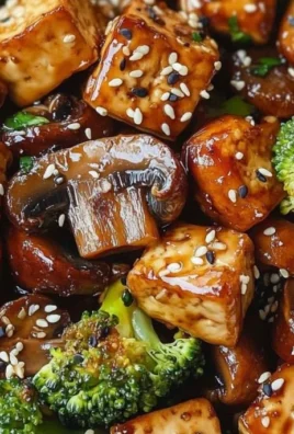 Delicious Mushroom Tofu Stir-Fry served in a bowl with vibrant vegetables.