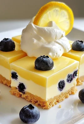 No-bake lemon blueberry icebox bars arranged on a plate