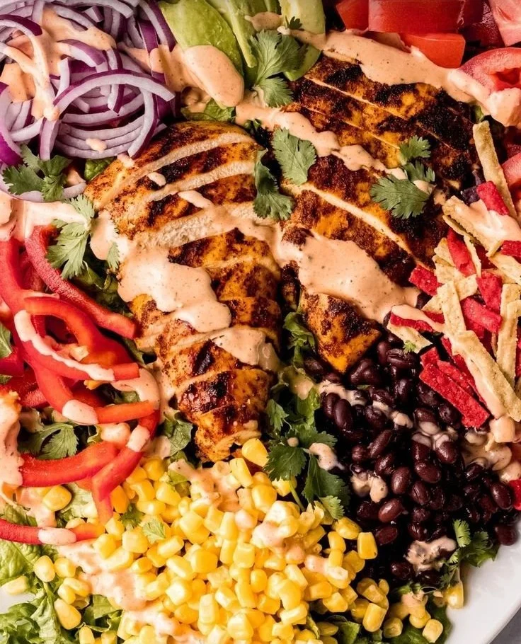 Spicy Southwest Avocado Chicken Salad with fresh ingredients and vibrant colors.
