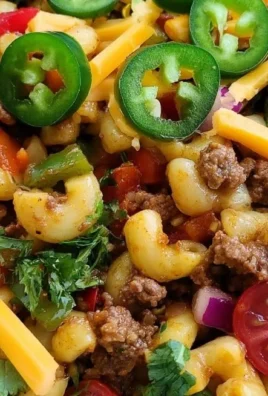 Delicious Cowboy Pasta Salad served in a rustic bowl with fresh vegetables