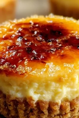 Delicious Crème Brûlée Cheesecake Cupcakes topped with caramelized sugar