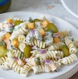 Delicious Dill Pickle Pasta Salad served in a bowl with fresh ingredients