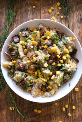 Earl's Warm Potato Salad served in a bowl with fresh herbs and spices.
