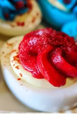 Festive Fourth of July deviled eggs garnished for summer celebrations.