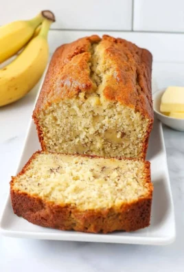 Slice of Hawaiian banana bread with tropical flavors and nuts