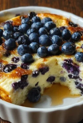 High protein blueberry cottage cheese bake topped with fresh blueberries