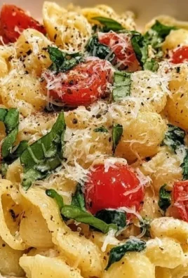 Creamy one pot lemon ricotta pasta garnished with herbs