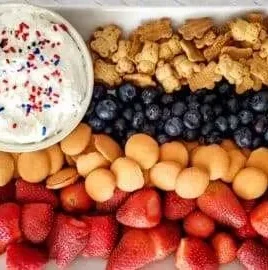 Red White and Blue Snack Board featuring vibrant fruits and snacks