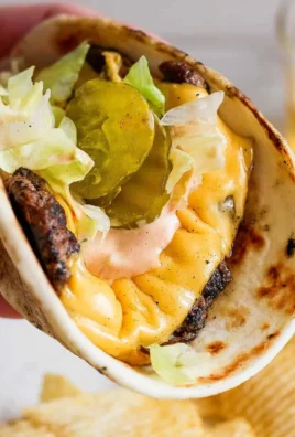 Smash Burger Taco with burger sauce on a plate
