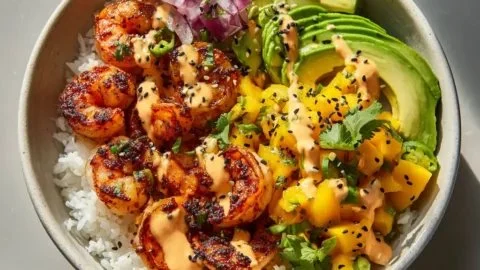 Delicious charred shrimp and avocado bowl recipe with fresh ingredients.