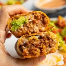 Homemade beef burritos with fresh ingredients ready for meal prep