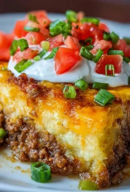 Cheesy Keto Taco Casserole topped with melted cheese