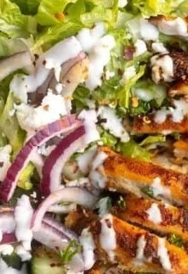 Delicious Chicken Shawarma Bowl with fresh vegetables and spices