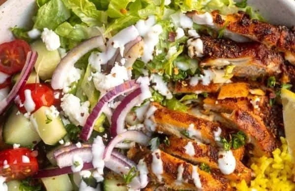 Delicious Chicken Shawarma Bowl with fresh vegetables and spices