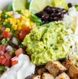 Homemade Chipotle burrito bowl with rice, beans, and fresh toppings